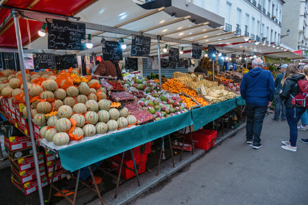 Paris, France - May 14, 2023: many tourist walking and shopping at Aligre Market in Parisのeditorial素材