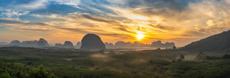 Mountain sunrise view at Din Deang Doi viewpoint with tropical forest, Krabi Thailand nature landscape panoramaの写真素材
