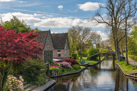Giethoorn Netherlands, city skyline at canal and traditional house in Giethoorn villageの写真素材