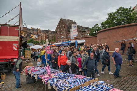 Hamburg, Germany - July 17, 2022: tourists crowd walking and shopping at famous Hamburg fish market (Fischmarkt)のeditorial素材