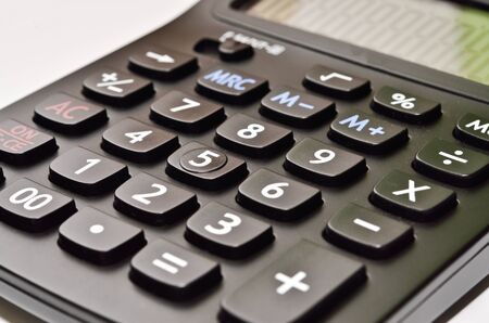 the close up of black calculatorの写真素材