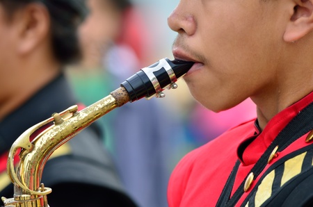 the musician playing Saxophone in paradeのeditorial素材