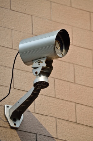 cctv security on the wall focus to strangerの写真素材