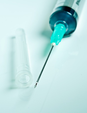 Close up of a syringe. Focus on needle.の写真素材