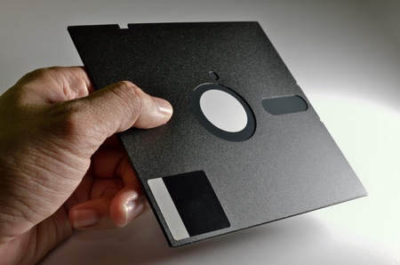 hand holding old format Diskette of 5,25 inchesの写真素材