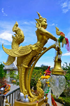 Golden Angle at Thai temple and blue sky , Bangkok, Thailandのeditorial素材