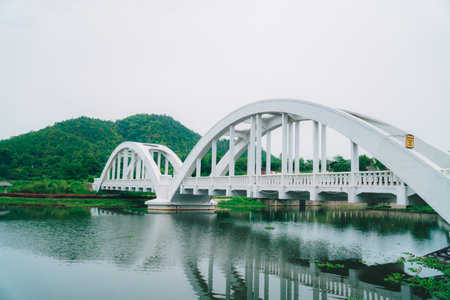 White Bridge in Lamphun Province, a historical railway trackの写真素材