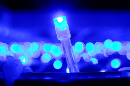 Many christmas lights blub on blueの写真素材