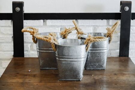 Rope flowerpot made by galvanized iron for decorate your home.の写真素材