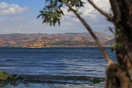 Yacht and landscape at Erhai lake Dali,, Yunnan province, Chinaのeditorial素材