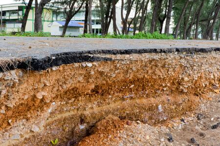 Road damage from sea erosion の写真素材