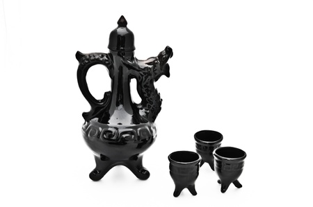 Black Chinese tea pot and cup on isolate white background の写真素材