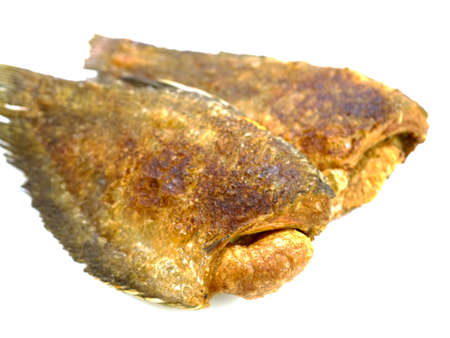 fried fish on whiteの写真素材