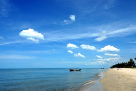 Blue sky background with white cloudsの写真素材