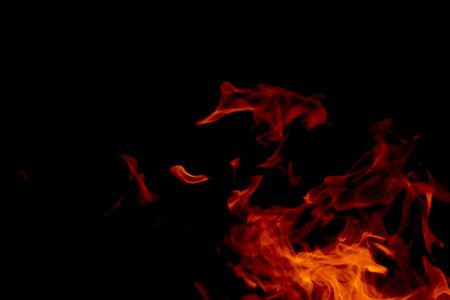 Fire flames on black backgroundの写真素材