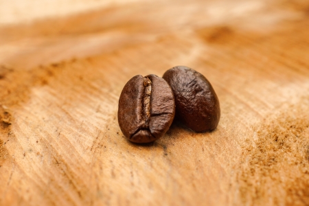 Coffee beans on the wooden background.の写真素材