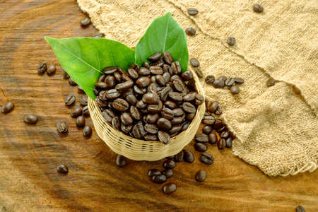Coffee beans on the wooden background.の写真素材