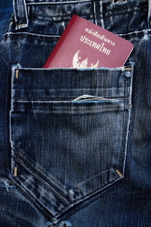 Abstract grunge jeans background and Thailand passport.の写真素材