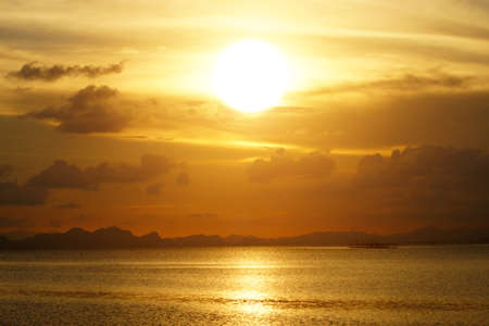 Beautiful sunset above the lakeの写真素材