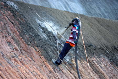 Spraying Cement into the mountains In order to prevent collapse