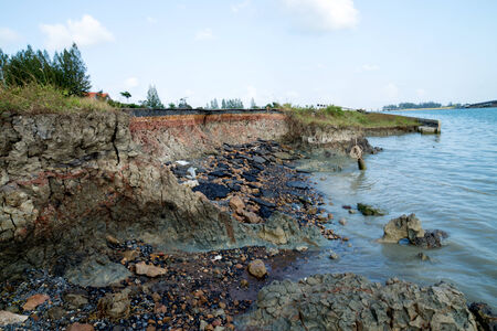 cut of soil with different layers at the Freshwater lake , Thailand 