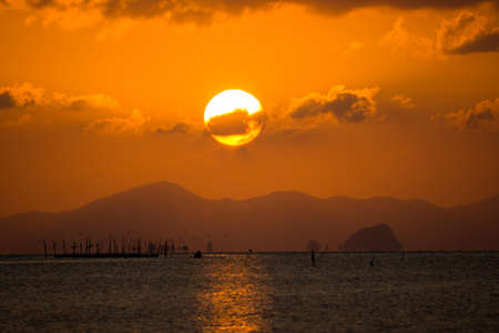 Sunset sky at Songkhla Lake, Thailand.の写真素材