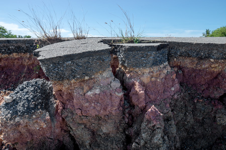 The curb erosion from storms. To indicate the layers of soil and rock.の写真素材