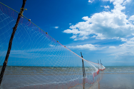 Fishing Net on the beaches at the cape in Southern of Thailand の写真素材