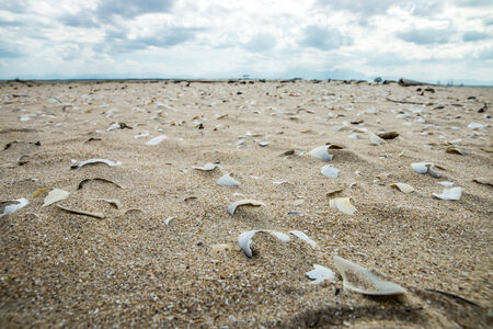 Beautiful sky and sand with white clouds の写真素材