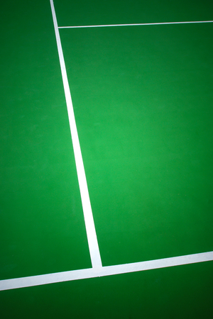 White line on green Tennis courtの写真素材