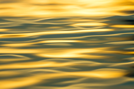 Abstract of reflective water surface backgroundの写真素材