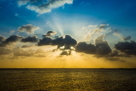 Sunset sky and clouds over the lake, Thailand.の写真素材