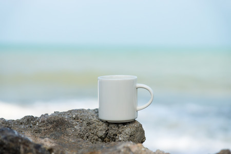 morning coffee on the beach.の写真素材