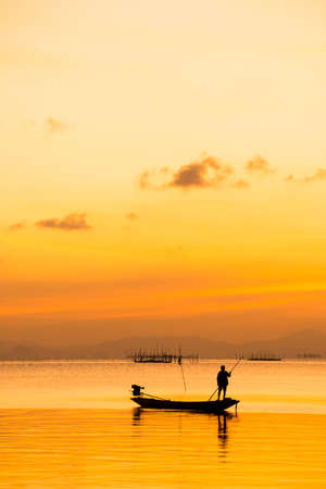 silhouette of fishermenの写真素材