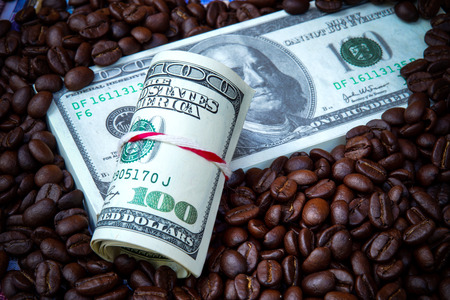 Money and roast coffee bean.の写真素材
