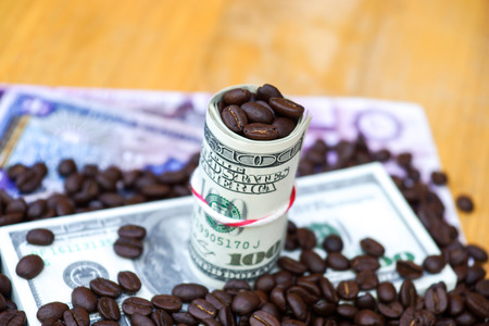 Money and roast coffee bean.の写真素材