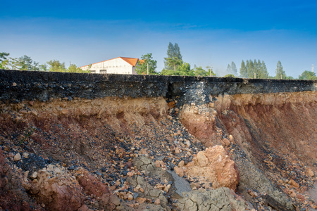 The curb erosion from storms. To indicate the layers of soil and rock.の写真素材