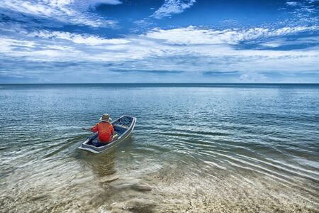 Fishing boat into the sea.の写真素材