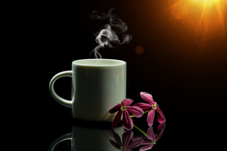 White coffee cup in the dark.の写真素材