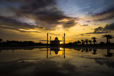 Beautiful sunset and silhouette of Central Songkhla Mosque, Thailand.の写真素材