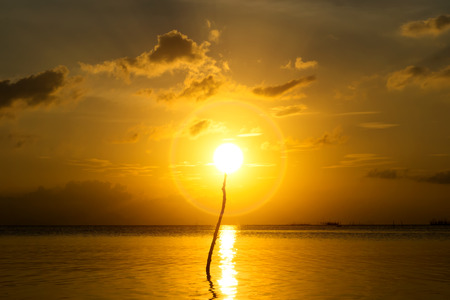 Sunset sky on the lake in south of Thailand., unfocused image.の写真素材
