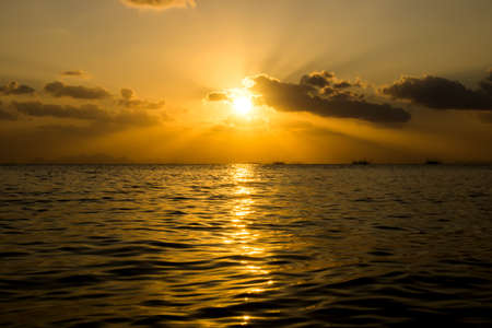 Sunset sky on the lake in south of Thailand., unfocused image.