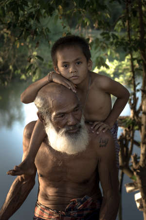 SONGKHLA THAILAND - Mar 3, 2016: Lifestyle grandfather playing with grandchildren on Mar 3, 2016 in Songkhla, Thailand.のeditorial素材