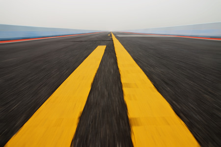 Motion on the road with yellow traffic lines.の写真素材