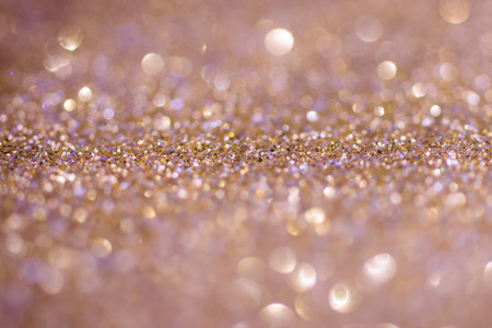 Gold Sparkling Glitter bokeh Background.の写真素材