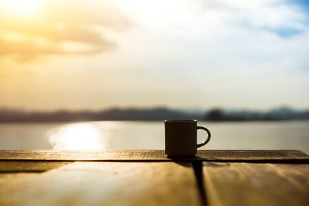 White coffee mug in the morning time.の写真素材