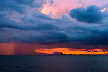 Clouds and rain are falling in the sea.