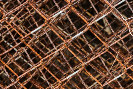 Old wire fence full of rust.