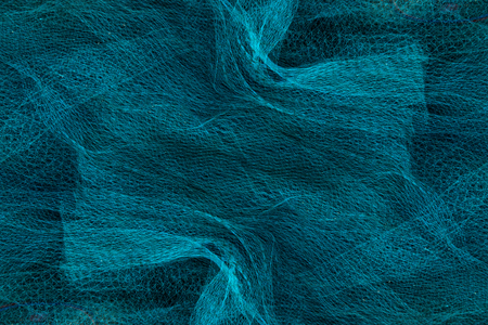 Blue nets background in the dark.