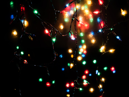 Light bokeh with a black background on Christmas night.